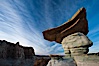 Pedestal rock, or hoodoo, at Stud Horse Point.  These hoodoos form when erosion occurs around but not underneath a more resistant caprock that sits atop of the hoodoo spire. Stud Horse Point, Page, Arizona, USA. Image #26609