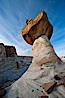 Pedestal rock, or hoodoo, at Stud Horse Point.  These hoodoos form when erosion occurs around but not underneath a more resistant caprock that sits atop of the hoodoo spire. Stud Horse Point, Page, Arizona, USA. Image #26610