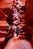 Canyoneering, hiking and exploring in Antelope Canyon slot canyon. Navajo Tribal Lands, Page, Arizona, USA. Image #26612