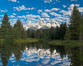 The Grand Tetons, reflected in the glassy waters of the Snake River at Schwabacher Landing, on a beautiful summer morning. Grand Teton National Park, Wyoming, USA. Image #26923