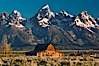 John Moulton barn at sunrise with Teton Range, on Mormon Row in Grand Teton National Park, Wyoming. Grand Teton National Park, Wyoming, USA. Image #26965