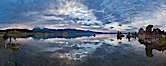 Mono Lake sunset, Sierra Nevada mountain range and tufas, clouds reflected in the still waters of Mono Lake. Mono Lake, California, USA. Image #26967