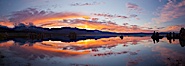 Mono Lake sunset, Sierra Nevada mountain range and tufas, clouds reflected in the still waters of Mono Lake. Mono Lake, California, USA. Image #26968