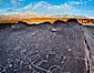 Sky Rock petroglyphs near Bishop, California.  Hidden atop on of the enormous boulders of the Volcanic Tablelands lies Sky Rock, a set of petroglyphs that face the sky.  These superb examples of native American petroglyph artwork are thought to be Paiute in origin, but little is known about them. Bishop, California, USA. Image #26973