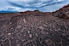 Sky Rock petroglyphs near Bishop, California.  Hidden atop an enormous boulder in the Volcanic Tablelands lies Sky Rock, a set of petroglyphs that face the sky.  These superb examples of native American petroglyph artwork are thought to be Paiute in origin, but little is known about them. Bishop, California, USA. Image #27000