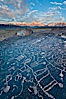 Sky Rock petroglyphs near Bishop, California.  Hidden atop on of the enormous boulders of the Volcanic Tablelands lies Sky Rock, a set of petroglyphs that face the sky.  These superb examples of native American petroglyph artwork are thought to be Paiute in origin, but little is known about them. Bishop, California, USA. Image #27009