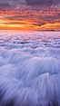 Sunset and incoming surf, gorgeous colors in the sky and on the ocean at dusk, the incoming waves are blurred in this long exposure. Carlsbad, California, USA. Image #27159