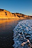 Torrey Pines State Beach, sandstone cliffs rise above the beach at Torrey Pines State Reserve. Torrey Pines State Reserve, San Diego, California, USA. Image #27248