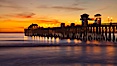 Oceanside Pier at sunset, clouds with a brilliant sky at dusk, the lights on the pier are lit. Oceanside Pier, Oceanside, California, USA. Image #27616