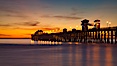 Oceanside Pier at sunset, clouds with a brilliant sky at dusk, the lights on the pier are lit. Oceanside Pier, Oceanside, California, USA. Image #27617