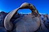 Mobius Arch at sunrise, framing snow dusted Lone Pine Peak and the Sierra Nevada Range in the background. Also known as Galen's Arch, Mobius Arch is found in the Alabama Hills Recreational Area near Lone Pine. Alabama Hills Recreational Area, California, USA. Image #27626
