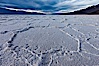 Salt polygons. After winter flooding, the salt on the Badwater Basin playa dries into geometric polygonal shapes. Badwater, Death Valley National Park, California, USA. Image #27632