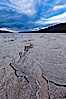 Salt polygons. After winter flooding, the salt on the Badwater Basin playa dries into geometric polygonal shapes. Badwater, Death Valley National Park, California, USA. Image #27633