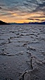 Salt polygons. After winter flooding, the salt on the Badwater Basin playa dries into geometric polygonal shapes. Badwater, Death Valley National Park, California, USA. Image #27635