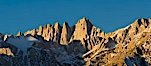 Mt. Whitney is the highest point in the contiguous United States with an elevation of 14,505 feet (4,421 m). It lies along the crest of the Sierra Nevada mountain range. Composed of the Sierra Nevada batholith granite formation, its eastern side (seen here) is quite steep. It is climbed by hundreds of hikers each year. Alabama Hills Recreational Area, California, USA. Image #27653