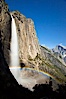 Yosemite Falls and rainbow, Half Dome in distance, viewed from the Yosemite Falls trail, spring. Yosemite Falls, Yosemite National Park, California, USA. Image #27742