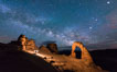 Light Painting and the Milky Way and Stars over Delicate Arch, at night, Arches National Park, Utah. USA. Image #29288