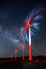 Ocotillo Wind Energy Turbines, at night with stars and the Milky Way in the sky above, the moving turbine blades illuminated by a small flashlight. California, USA. Image #30239