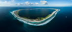 Aerial panorama of Clipperton Island, showing the entire atoll.  Clipperton Island, a minor territory of France also known as Ile de la Passion, is a small (2.3 sq mi) but  spectacular coral atoll in the eastern Pacific. By permit HC / 1485 / CAB (France). Image #32843