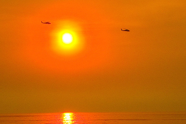 Choppers over Ponto at sunset