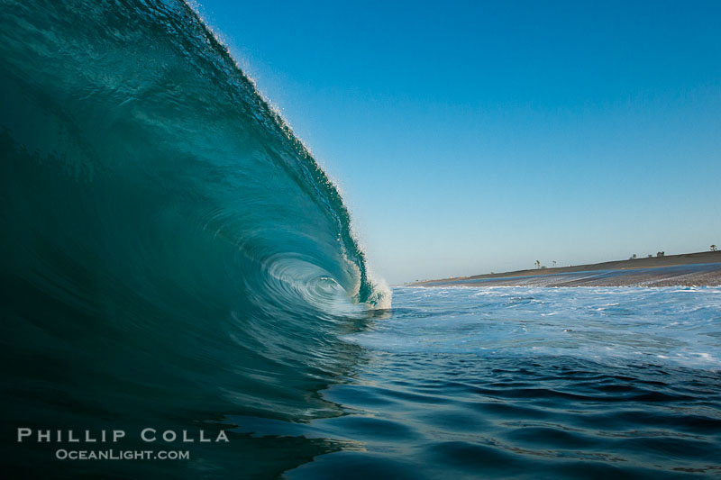 Newport Beach surf photo, morning tube, sunrise, glisteny wave