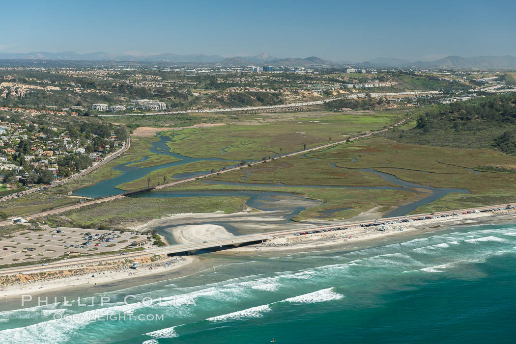 Aerial photo of Los Penasquitos Lagoon. Los Peasquitos Marsh Natural Preserve and Lagoon is a coastal marsh in San Diego County, California, USA situated at the northern edge of the City of San Diego, forming the natural border with Del Mar, California., natural history stock photograph, photo id 30619