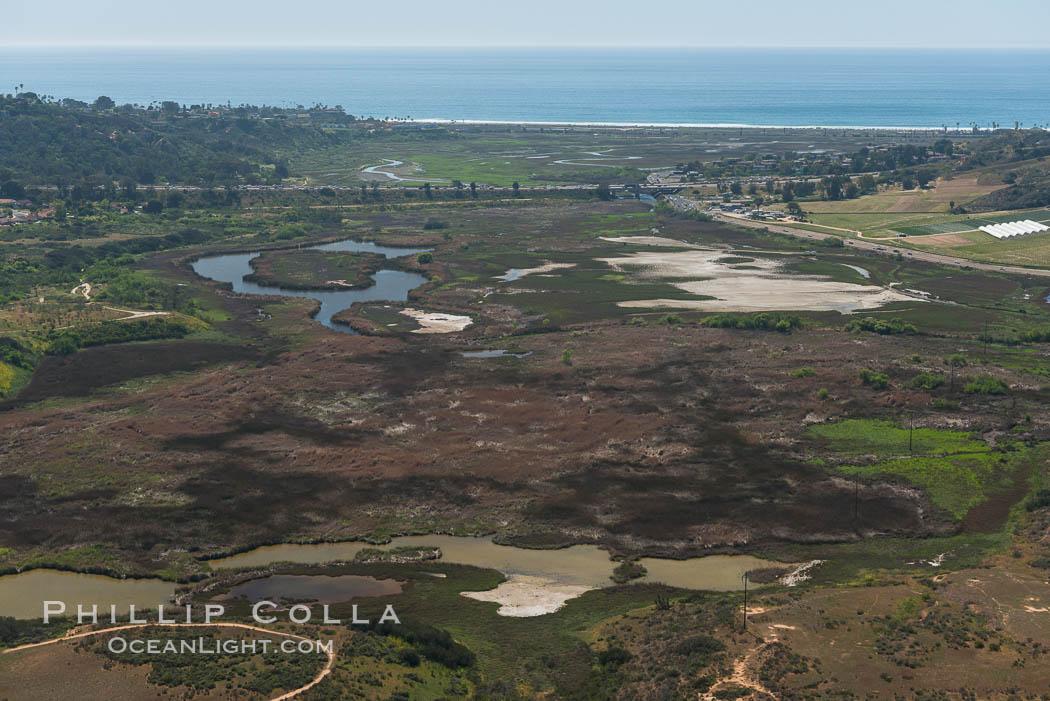 Aerial Photo of San Elijo Lagoon. San Elijo Lagoon Ecological Reserve is one of the largest remaining coastal wetlands in San Diego County, California, on the border of Encinitas, Solana Beach and Rancho Santa Fe. USA, natural history stock photograph, photo id 30590