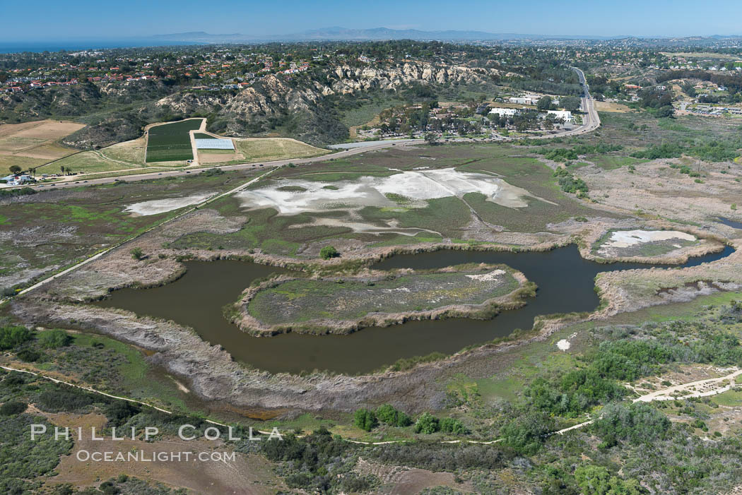 Aerial Photo of San Elijo Lagoon. San Elijo Lagoon Ecological Reserve is one of the largest remaining coastal wetlands in San Diego County, California, on the border of Encinitas, Solana Beach and Rancho Santa Fe. USA, natural history stock photograph, photo id 30587