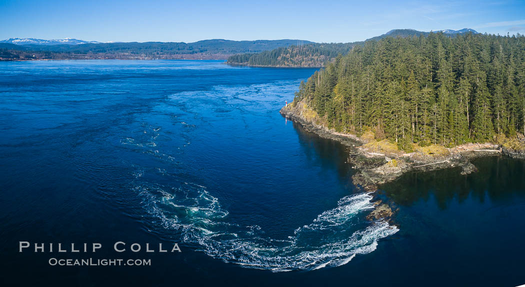 Seymour Narrows with strong tidal currents.  Between Vancouver Island and Quadra Island, Seymour Narrows is about 750 meters wide and has currents reaching 15 knots.  Aerial photo. British Columbia, Canada, natural history stock photograph, photo id 34490