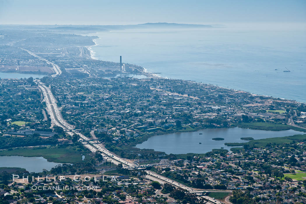 Aerial view of coastal Carlsbad and Oceanside, looking south.  The I-5 freeway and Buena Vista Lagoon are seen in the center of the photo., natural history stock photograph, photo id 26045