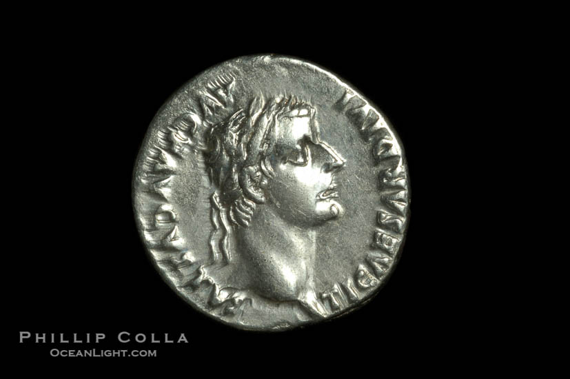 An original tribute penny.  Roman emperor Tiberius (14-37 A.D.), depicted on ancient Roman coin (silver, denom/type: Denarius) (AR, Denarius Obverse: Bust right TI CEASAR DIVI AVG F AVGVSTVS. Reverse: Livia seated right, holding olive branch, ornate legs on chair. PONTIF MAXIM. Tribute penny. Sear 567.)., natural history stock photograph, photo id 06528