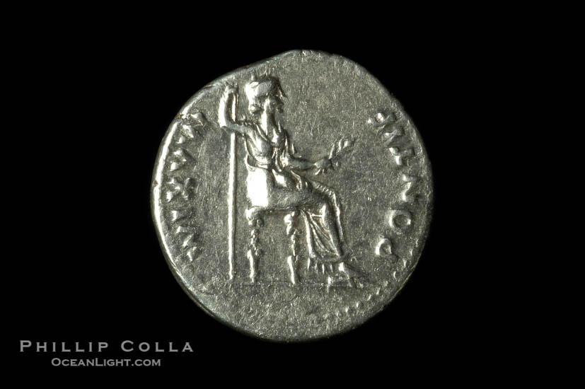 An original tribute penny.  Roman emperor Tiberius (14-37 A.D.), depicted on ancient Roman coin (silver, denom/type: Denarius) (AR, Denarius Obverse: Bust right TI CEASAR DIVI AVG F AVGVSTVS. Reverse: Livia seated right, holding olive branch, ornate legs on chair. PONTIF MAXIM. Tribute penny. Sear 567.)., natural history stock photograph, photo id 06529