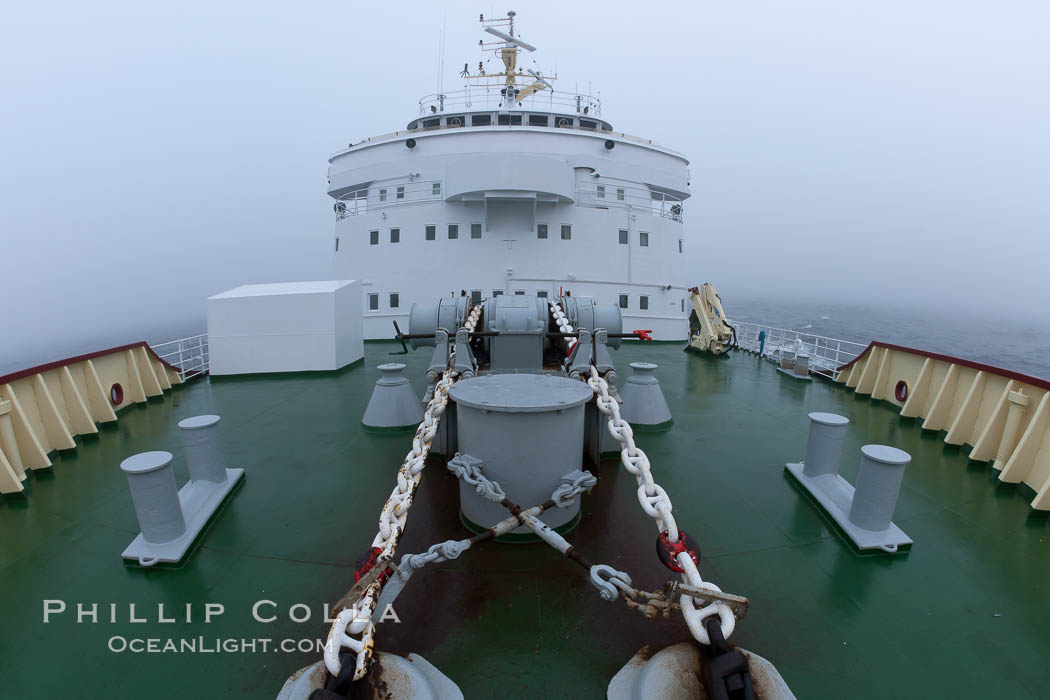 Anchor chains and winches, bow deck and rails, and forward structure of the M/V Polar Star. Southern Ocean, natural history stock photograph, photo id 24165