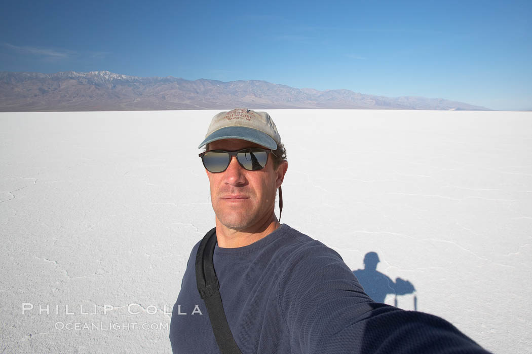 Self portrait on salt pan, Death Valley National Park, California