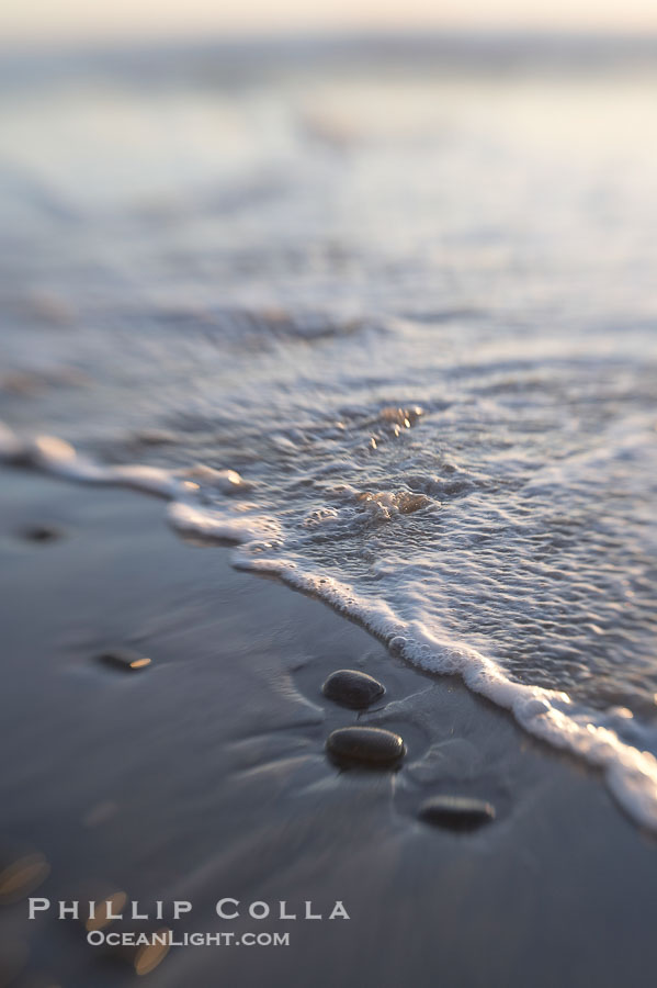 Beach stones, sea water, sand, reflections of sunset., natural history stock photograph, photo id 17986