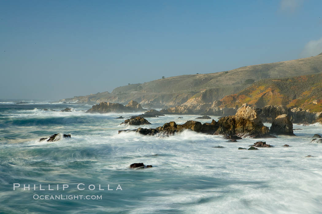 Waves blur as they break over the rocky shoreline of Big Sur. California, USA, natural history stock photograph, photo id 14905