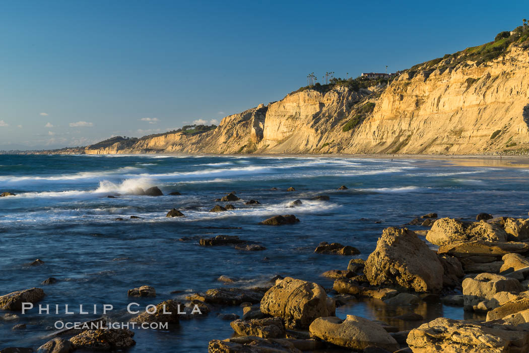 Black's Beach sea cliffs, sunset, looking north from Scripps Pier with Torrey Pines State Reserve in the distance. La Jolla, California, USA, natural history stock photograph, photo id 29170