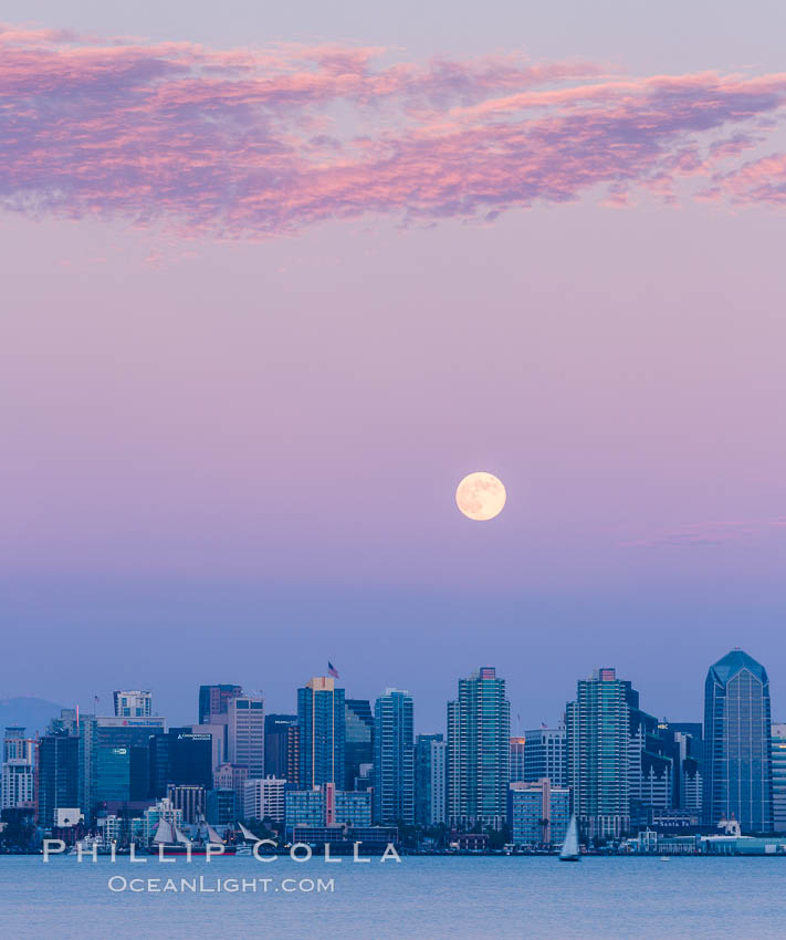 Blue Moon at Sunset over San Diego City Skyline.  The third full moon in a season, this rare "blue moon" rises over San Diego just after sundown. California, USA, natural history stock photograph, photo id 28755
