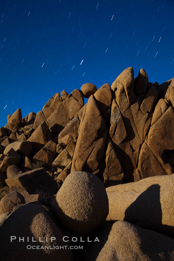 Boulders and stars, moonlight in Joshua Tree National Park. The moon gently lights unusual boulder formations at Jumbo Rocks in Joshua Tree National Park, California. USA, natural history stock photograph, photo id 27717