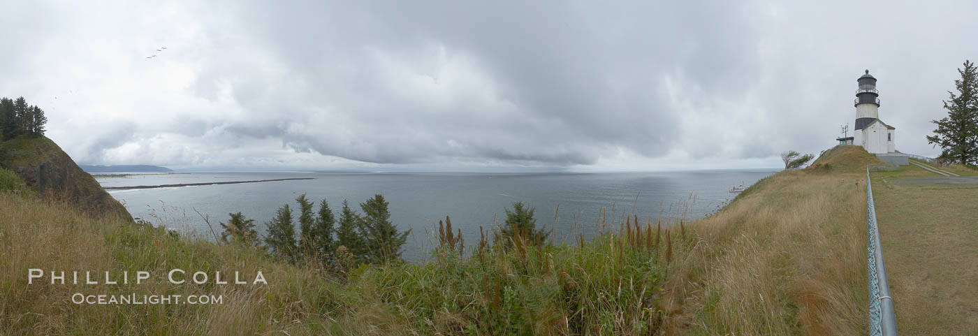 The Cape Disappointment lighthouse has watched over the entrance of the Columbia River since it was first lit on October 15, 1856. It stands 53 feet tall with a focal plane 220 feet above sea. Its black horizontal stripe was added later to distinguish it from North Head Lighthouse located just two miles north. Washington, USA, natural history stock photograph, photo id 19389