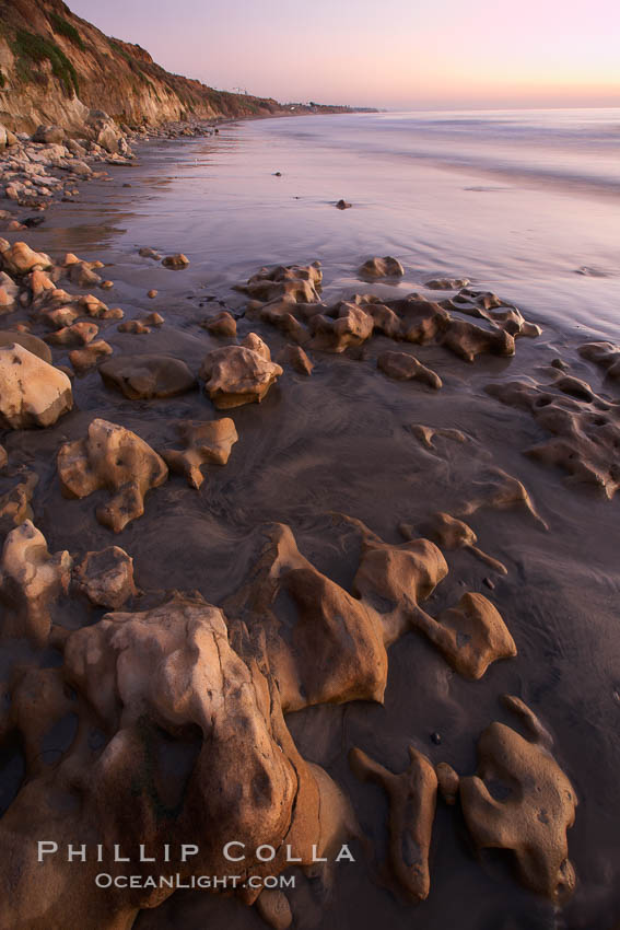 Rocks, sand, ocean and sea cliffs, sunset. Carlsbad, California, USA, natural history stock photograph, photo id 22199
