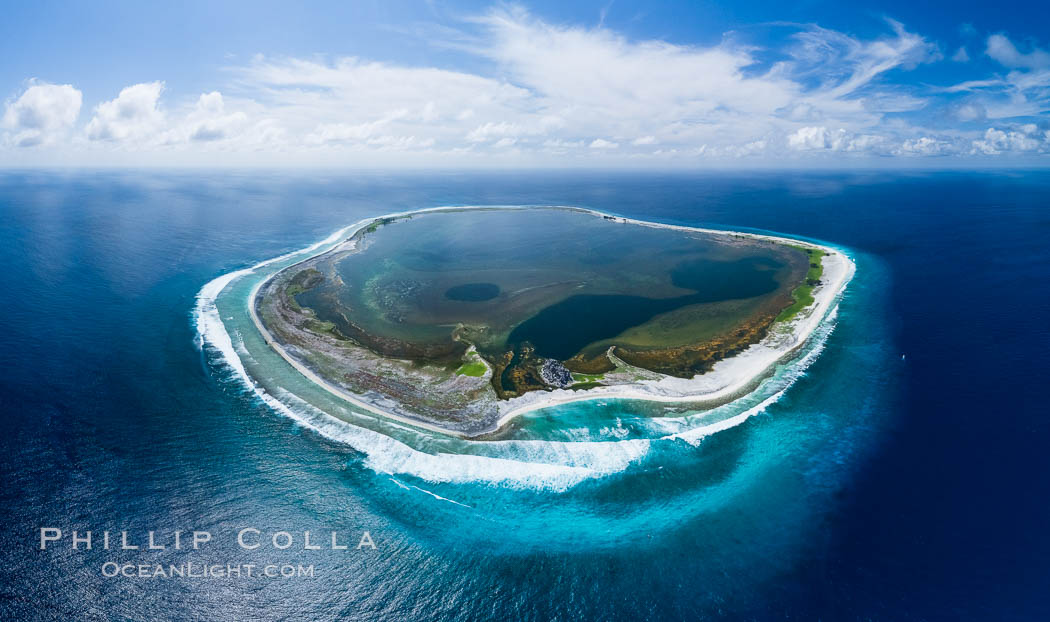 Aerial panorama of Clipperton Island, showing the entire atoll.  Clipperton Island, a minor territory of France also known as Ile de la Passion, is a small (2.3 sq mi) but  spectacular coral atoll in the eastern Pacific. By permit HC / 1485 / CAB (France)., natural history stock photograph, photo id 32835
