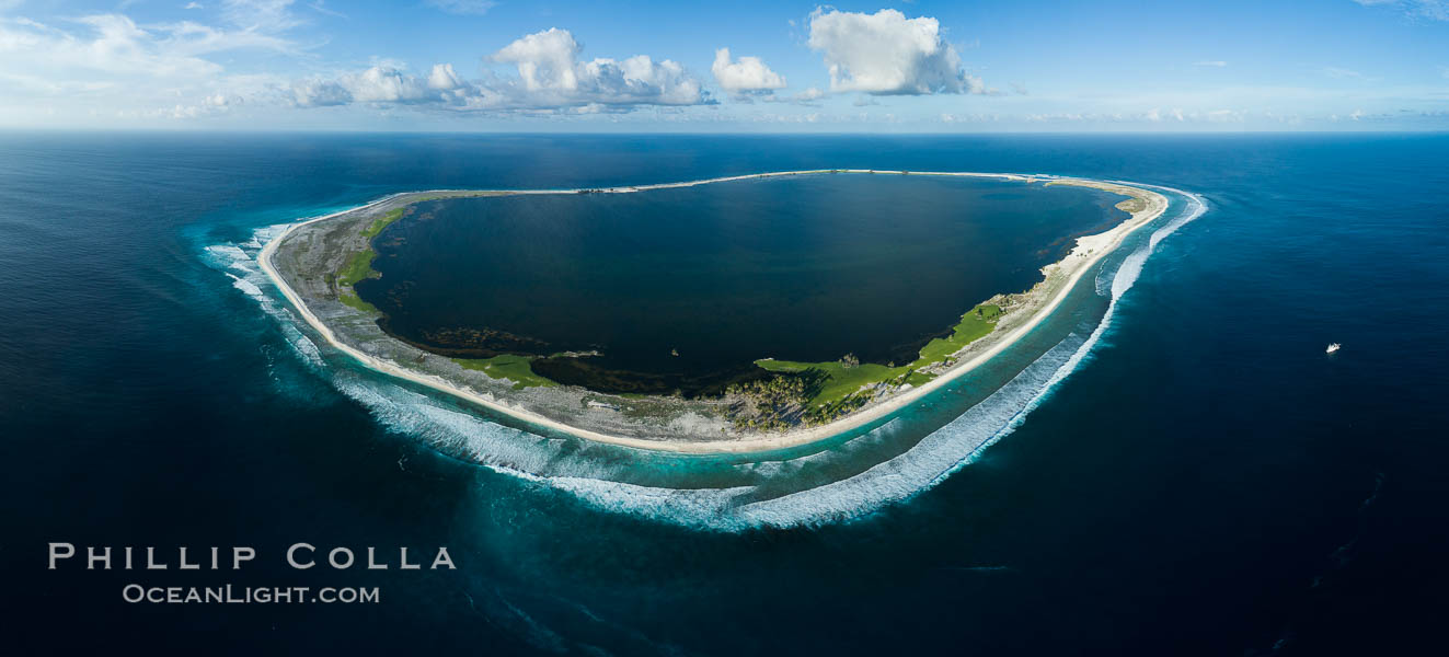 Aerial panorama of Clipperton Island, showing the entire atoll.  Clipperton Island, a minor territory of France also known as Ile de la Passion, is a small (2.3 sq mi) but  spectacular coral atoll in the eastern Pacific. By permit HC / 1485 / CAB (France)., natural history stock photograph, photo id 32843