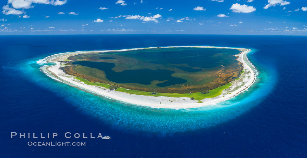 Aerial panorama of Clipperton Island, showing the entire atoll.  Clipperton Island, a minor territory of France also known as Ile de la Passion, is a small (2.3 sq mi) but  spectacular coral atoll in the eastern Pacific. By permit HC / 1485 / CAB (France)