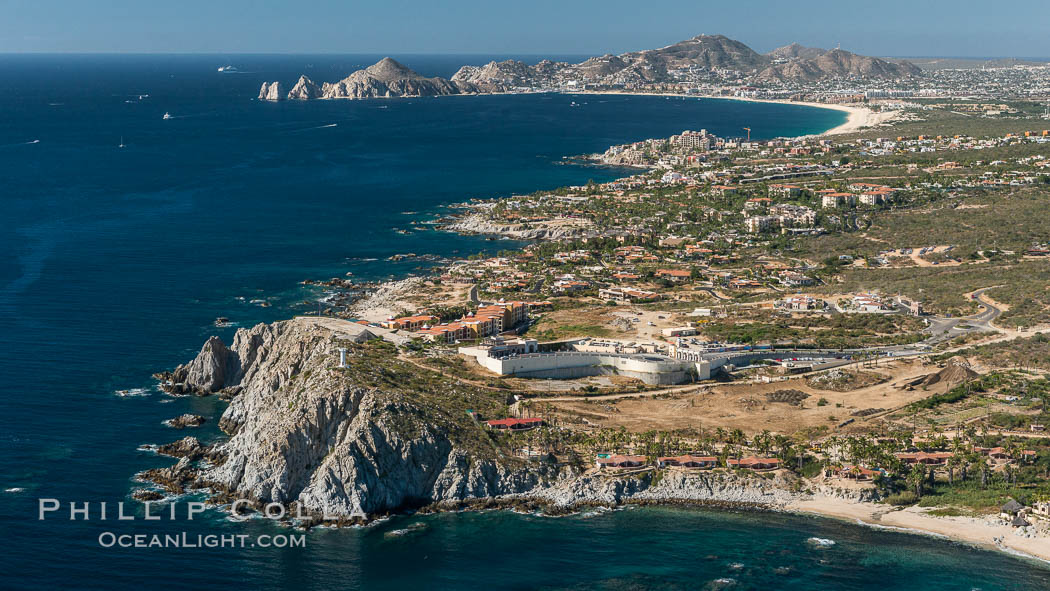 Punta Ballena, Faro Cabesa Ballena (foreground), Medano Beach and Land's End (distance). Residential and resort development along the coast near Cabo San Lucas, Mexico