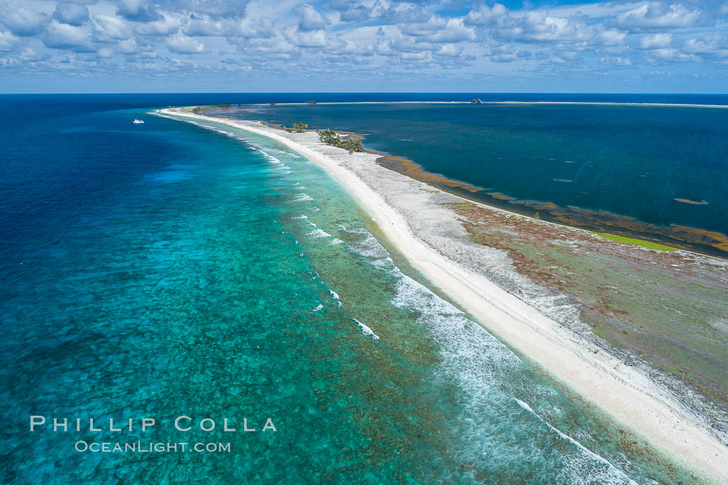 Coral Reef at Clipperton Island, aerial photo. Clipperton has healthy, beatiful coral reefs.  The white beaches are composed of white coralline rubble. Clipperton Island, a minor territory of France also known as Ile de la Passion, is a spectacular coral atoll in the eastern Pacific. By permit HC / 1485 / CAB (France)., natural history stock photograph, photo id 32891