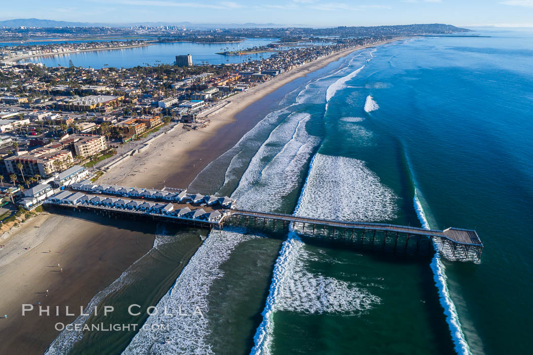 Crystal Pier and Pacific Beach coastline, Mission Bay, Point Loma and San Diego visible in the distance, aerial photo. California, USA, natural history stock photograph, photo id 37975