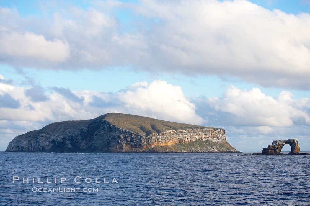 Darwin Island, with the Arch on the right.  Darwin Island is the northernmost of the Galapagos Islands and is home to enormous numbers of seabirds