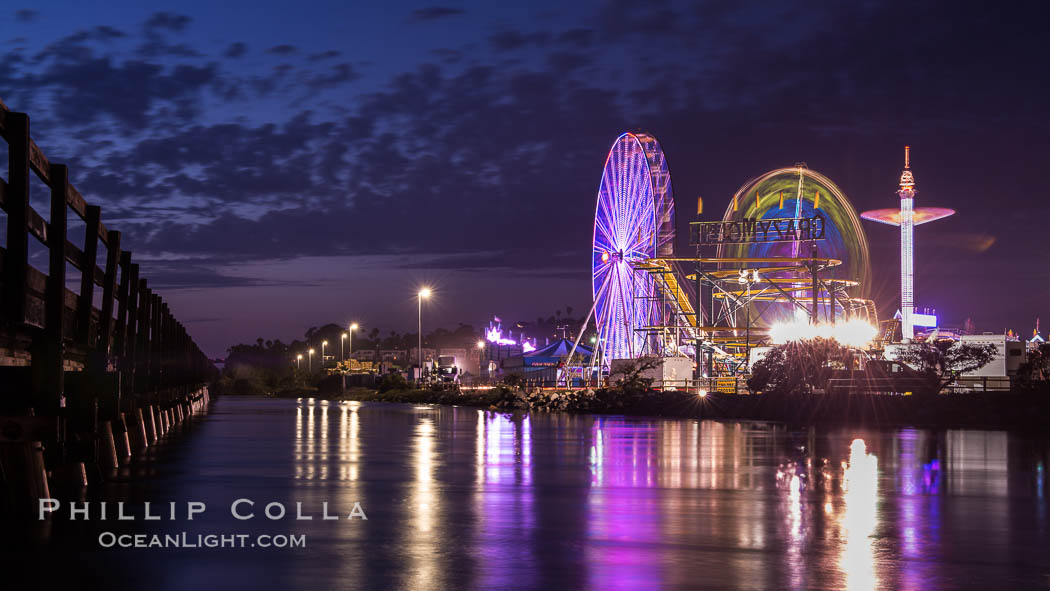 Del Mar Fair and San Dieguito Lagoon at Night.  Lights from the San Diego Fair reflect in San Dieguito Lagooon, with the train track trestles to the left. California, USA, natural history stock photograph, photo id 31024