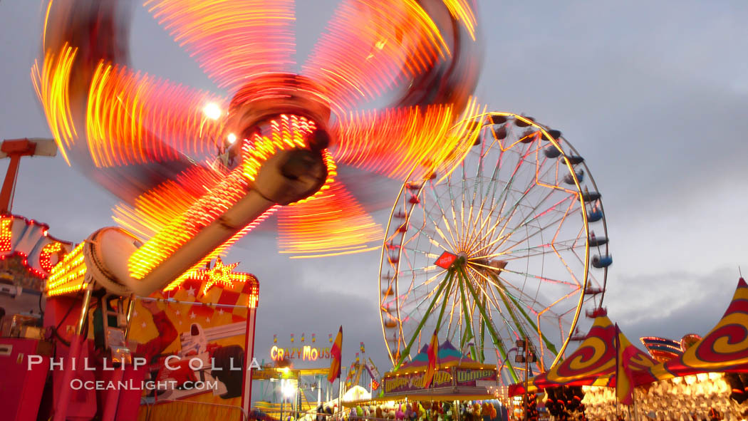 Ferris wheel and fair rides at sunset, blurring due to long exposure. Del Mar Fair, California, USA, natural history stock photograph, photo id 20872